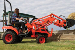 Kioti CS2610 Compact Tractor | ROPS | 25hp | Hydrostatic | Includes Loader and 4-in-1 Bucket | CS Series