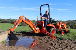 Kioti CS2610 Compact Tractor | ROPS | 25hp | Hydrostatic | Includes Loader and 4-in-1 Bucket | CS Series