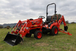 Kioti CS2610 Compact Tractor | ROPS | 25hp | Hydrostatic | Includes Loader and 4-in-1 Bucket | CS Series