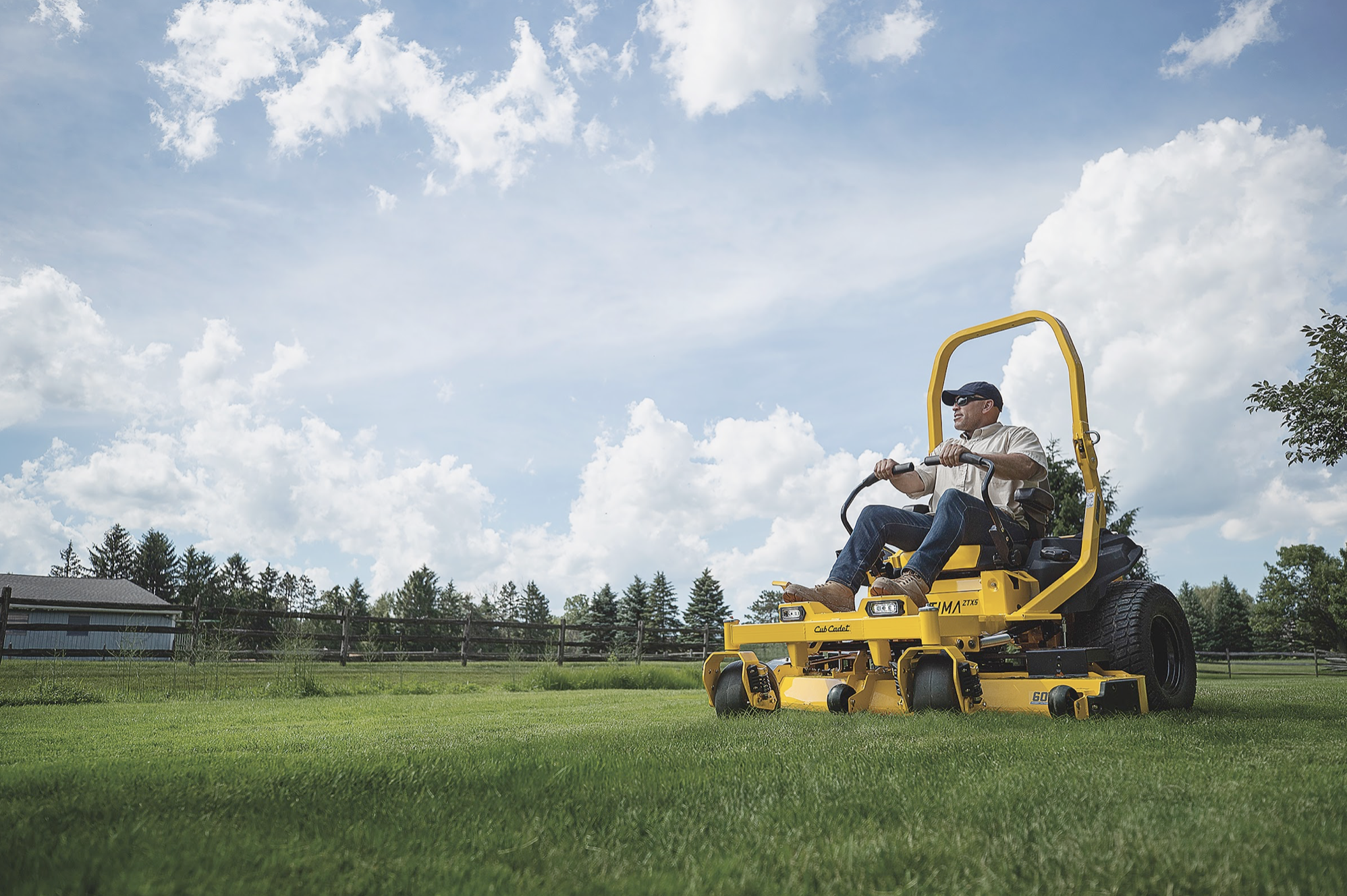 KC Equipment mower operating in a field